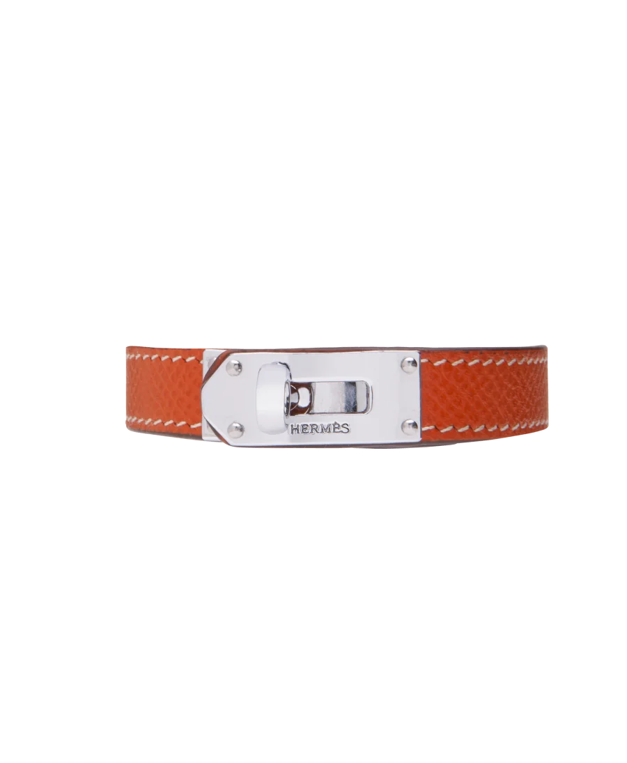 Bracelet de la maison de luxe Hermès en Acier et Cuir orange. Disponible chez VIRTU LUXURY.